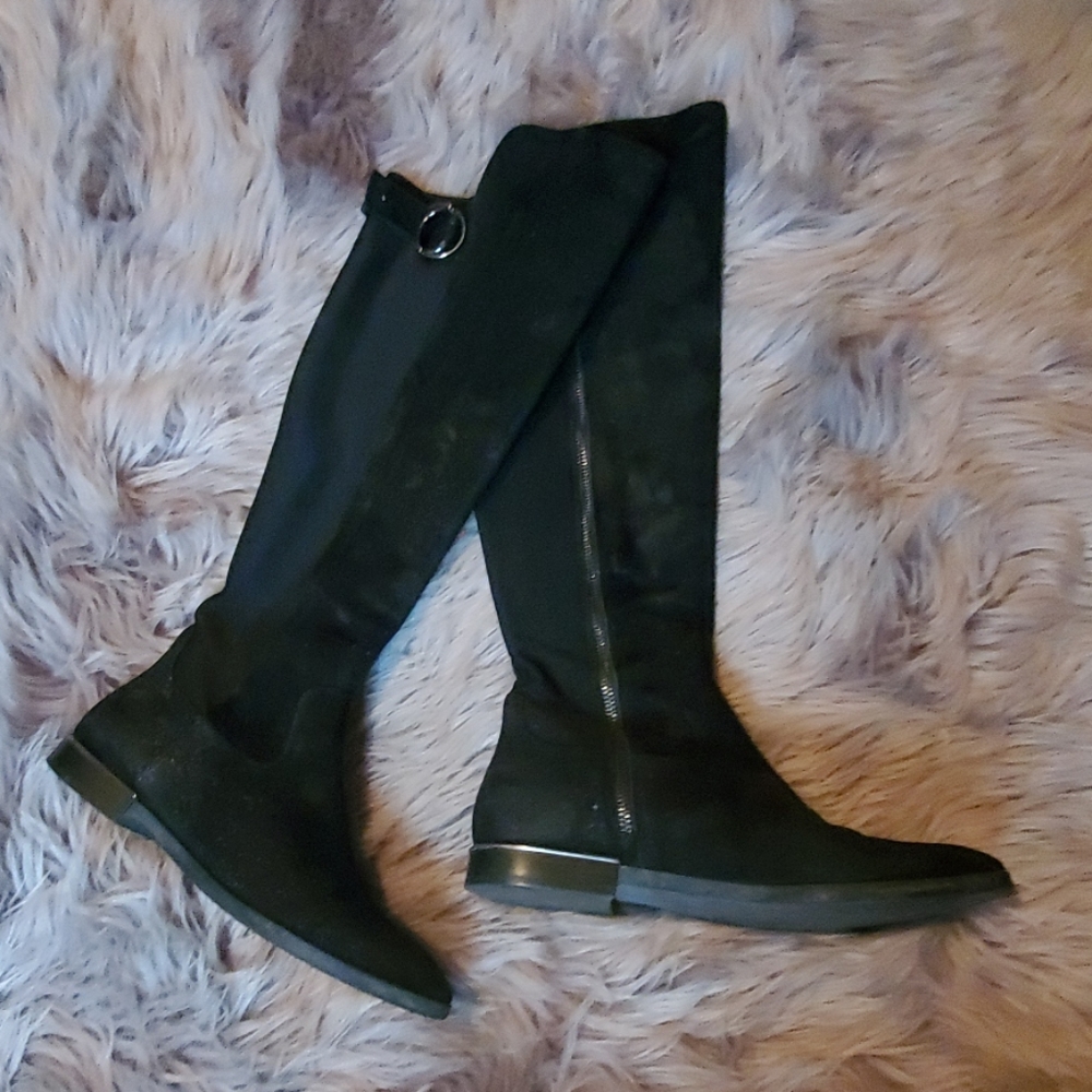 Black Calvin Klein OTK boots.
